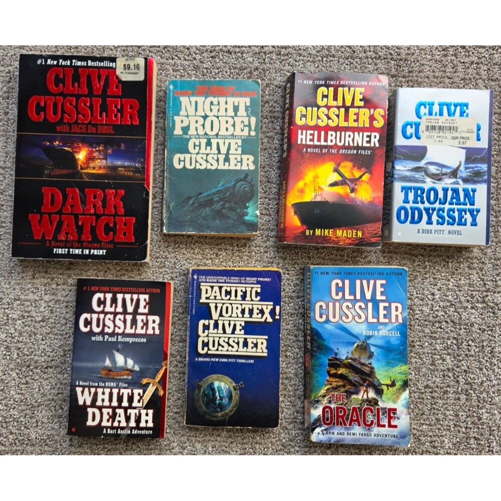 Clive Cussler Lot of 7 Paperback Books Thrillers Mystery Historical Maritime